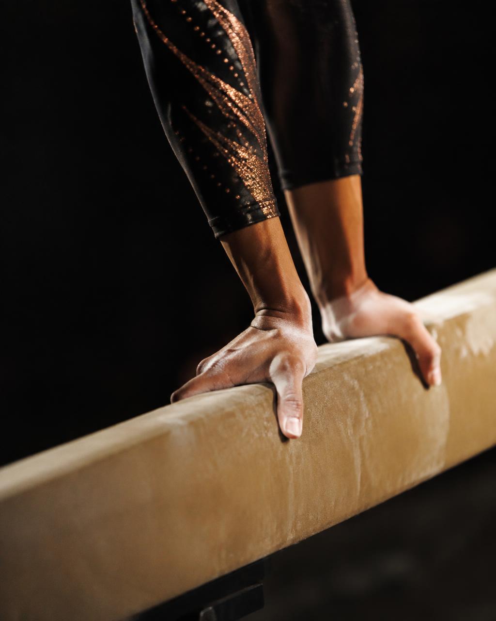 Chalked hands on a beam